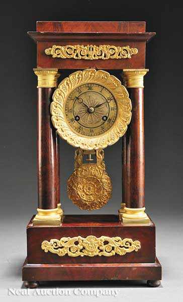 Appraisal: A Napoleon III Mahogany and Gilt Bronze Portico Clock th