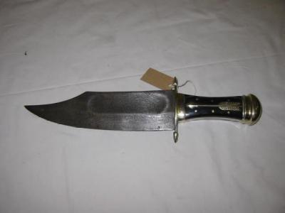 Appraisal: A LARGE BOWIE KNIFE with acid etched single sided blade