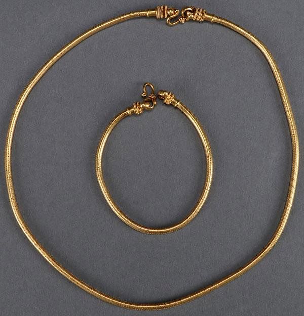 Appraisal: A HIGH KARAT GOLD NECKLACE AND BRACELET TH C A