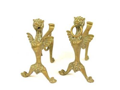 Appraisal: A pair of late th century gilt brass fire dogs