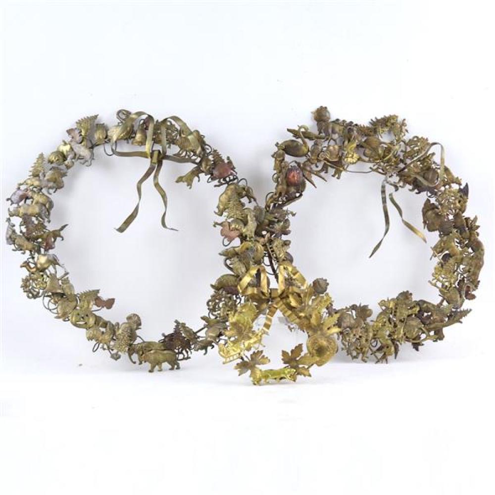 Appraisal: THREE VINTAGE VICTORIAN BRASS HOLIDAY WREATHS WITH BOWS AND HOLIDAY