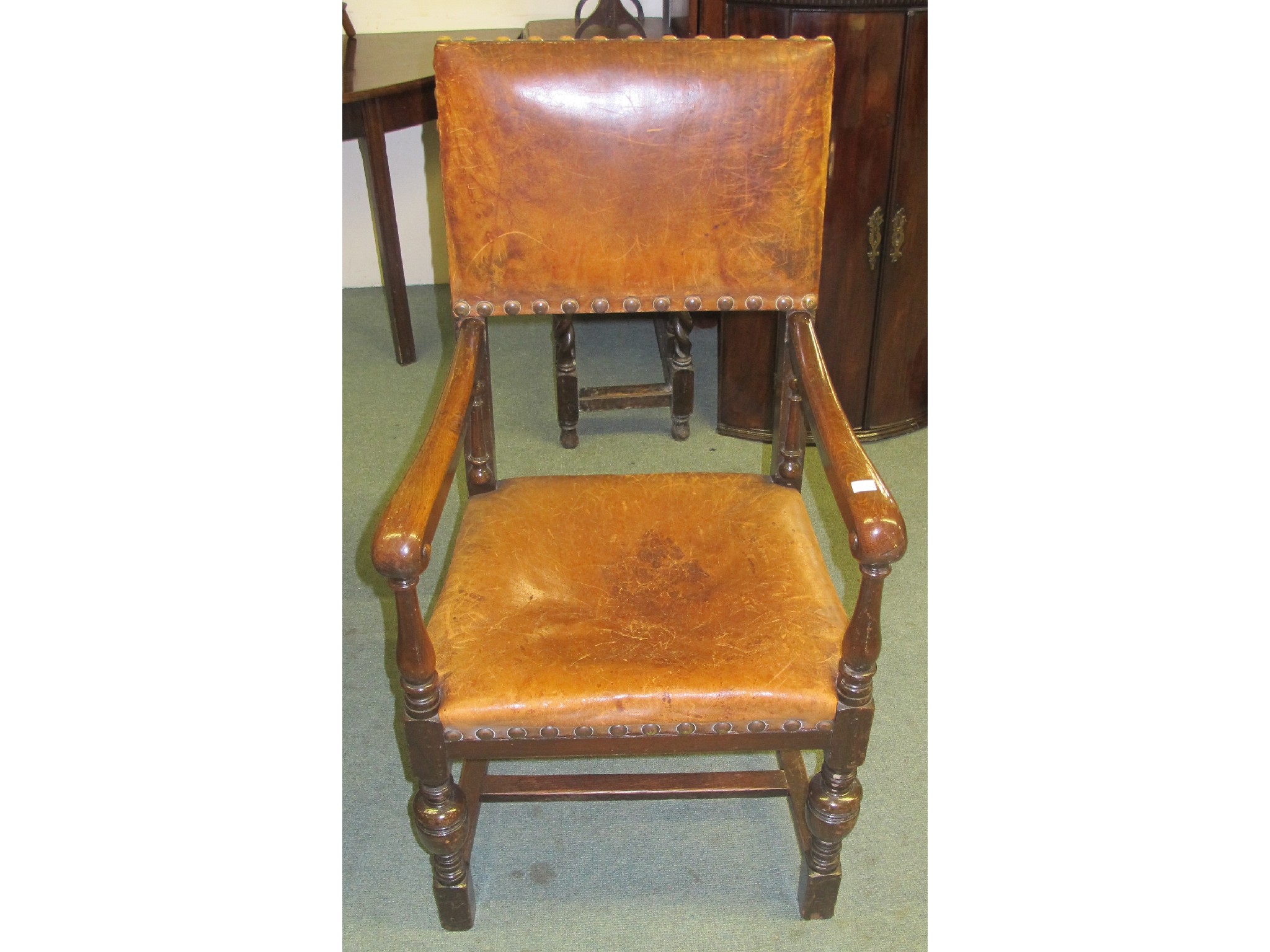 Appraisal: Oak and leather dining armchair