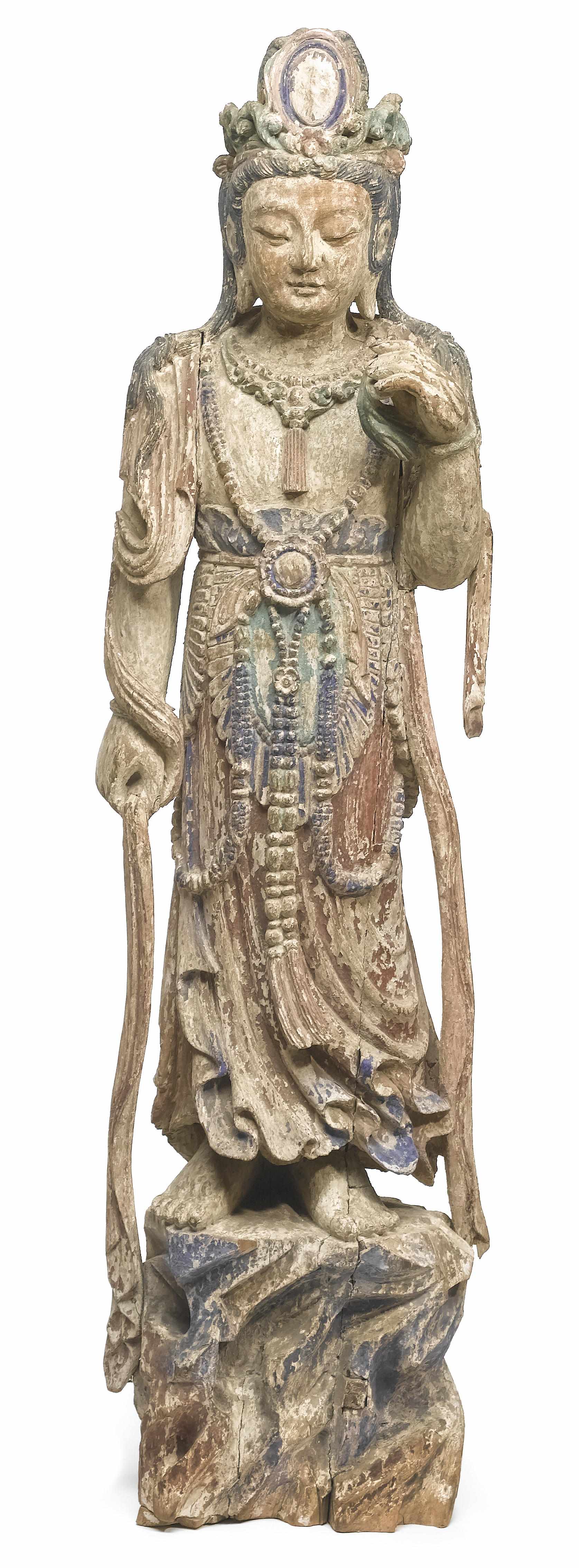 Appraisal: A Chinese polychrome wood standing figure of Guanyin late Qing