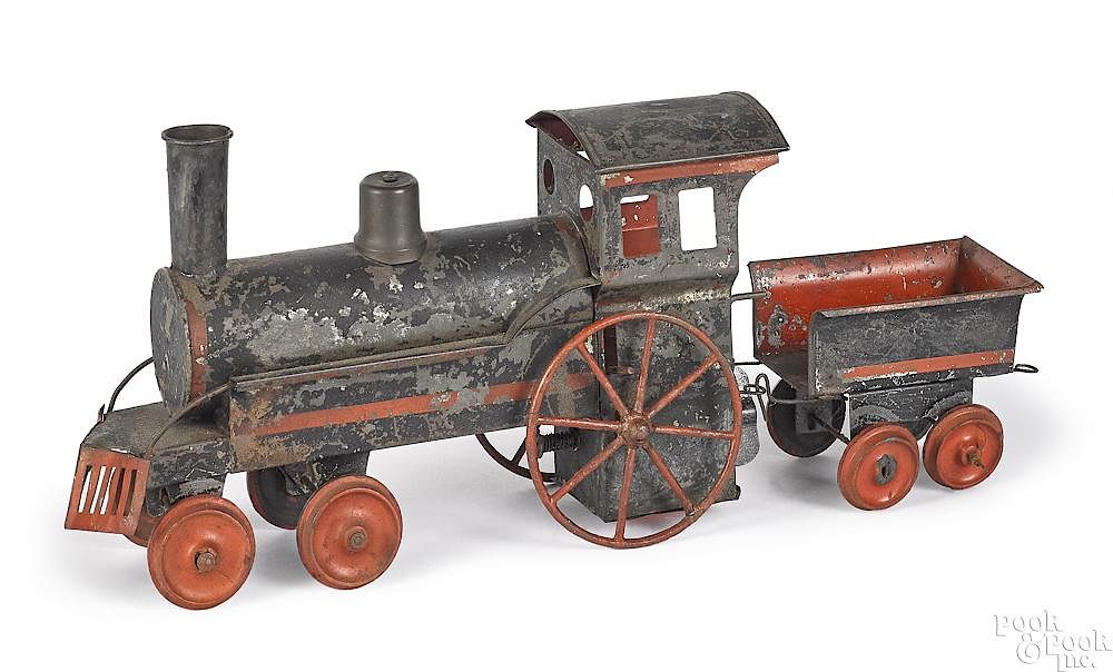 Appraisal: Early German tinplate clockwork train locomotive Early German tinplate clockwork