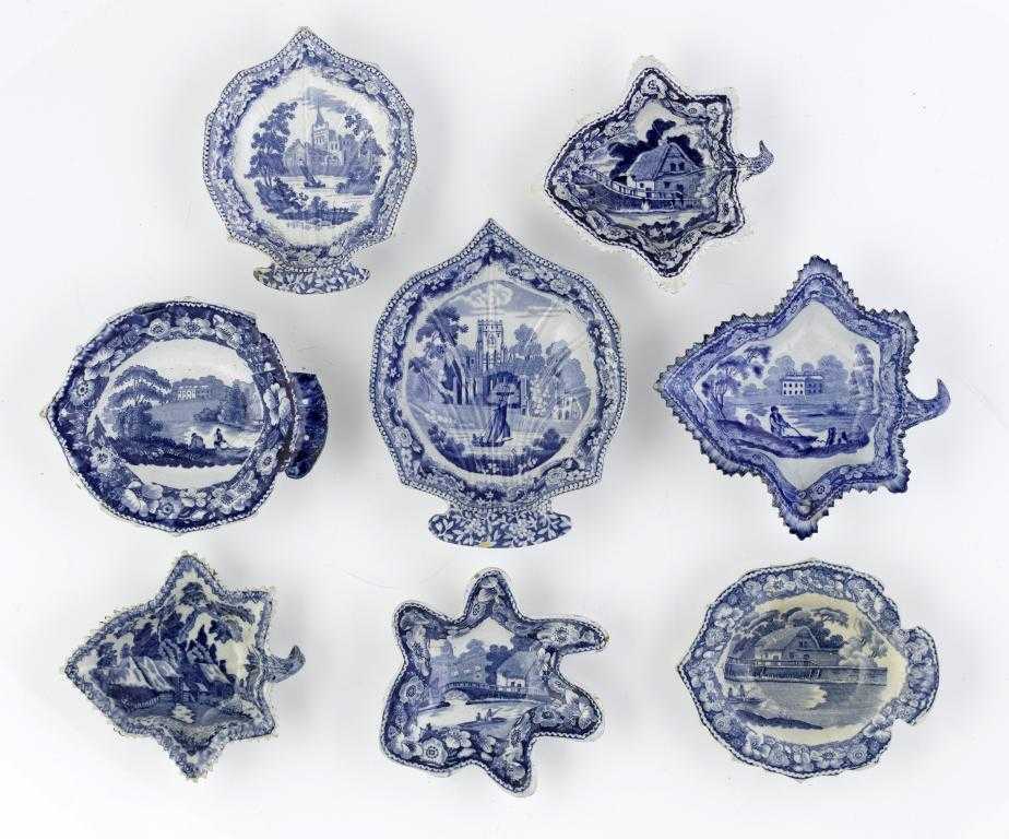 Appraisal: EIGHT BLUE PRINTED EARTHENWARE PICKLE DISHES of leaf shape Wild