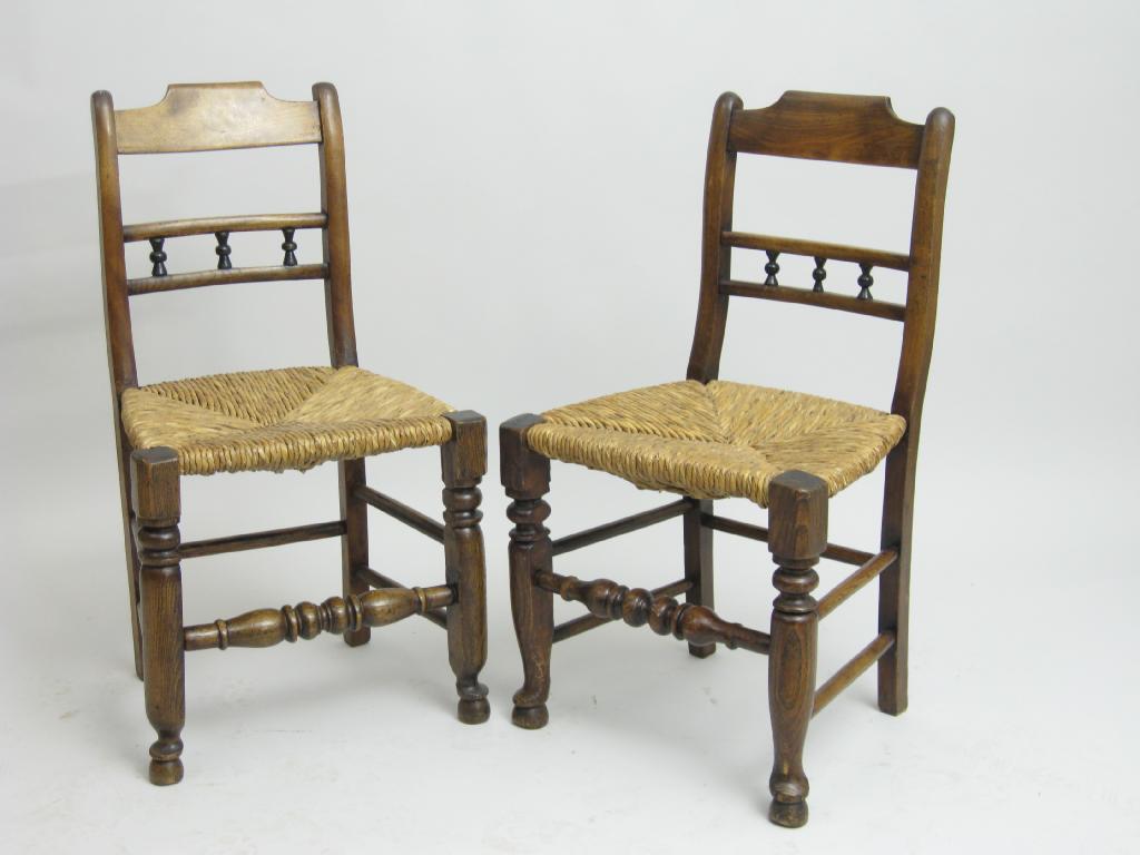 Appraisal: A set of six ash and fruitwood Dining Chairs with