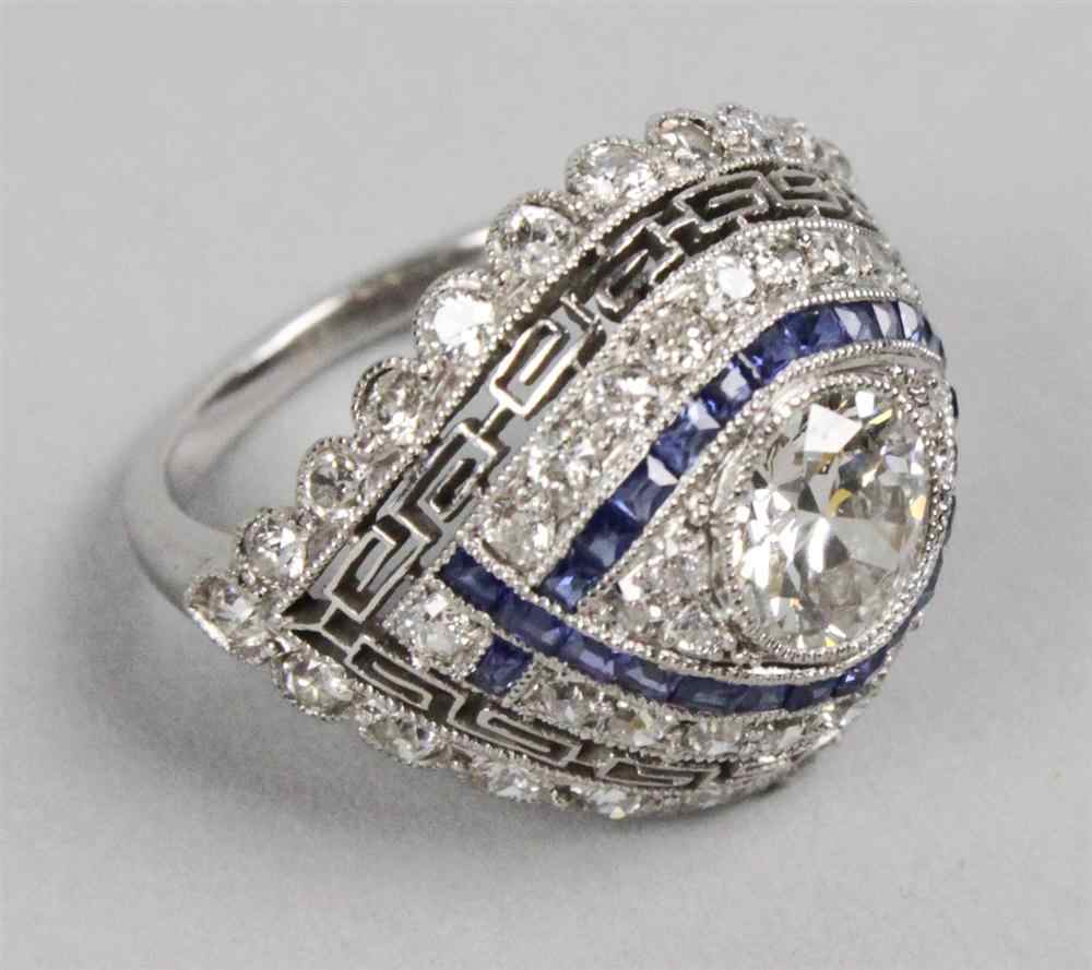 Appraisal: LADY'S EDWARDIAN PLATINUM DIAMOND AND SAPPHIRE COCKTAIL RING centered by