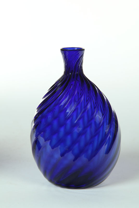 Appraisal: FLASK American th century glass Indigo-cobalt with eighteen swirled ribs