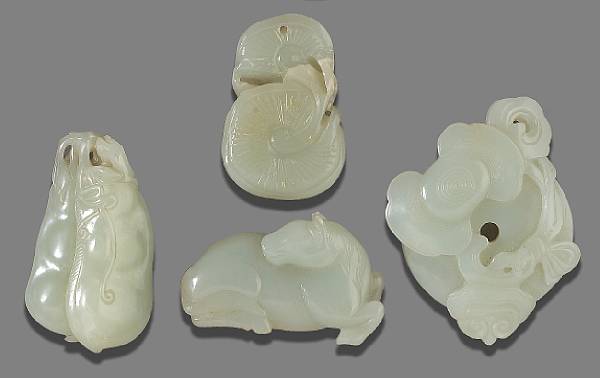 Appraisal: A group of four small white jade carvings The first