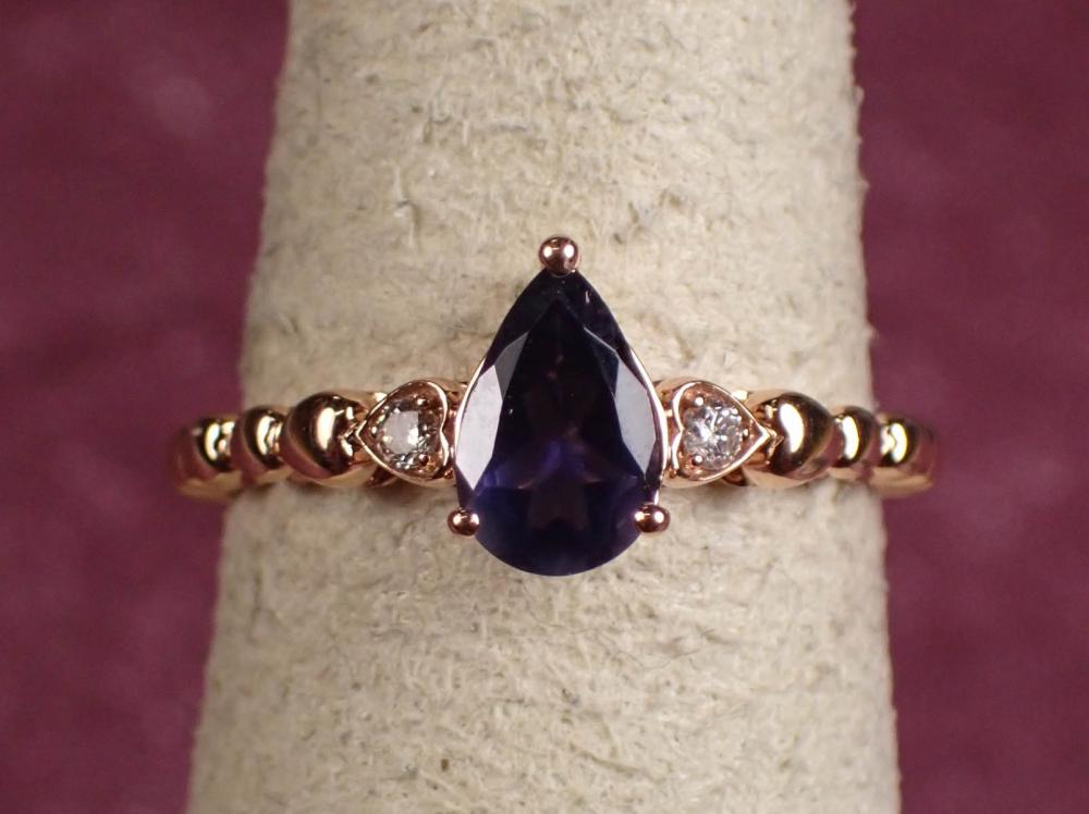 Appraisal: IOLITE DIAMOND AND FOURTEEN KARAT GOLD RING The rose gold