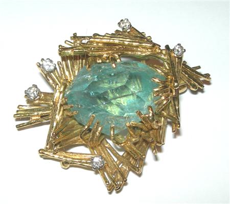 Appraisal: A modern aquamarine and diamond set brooch of asymmetric design