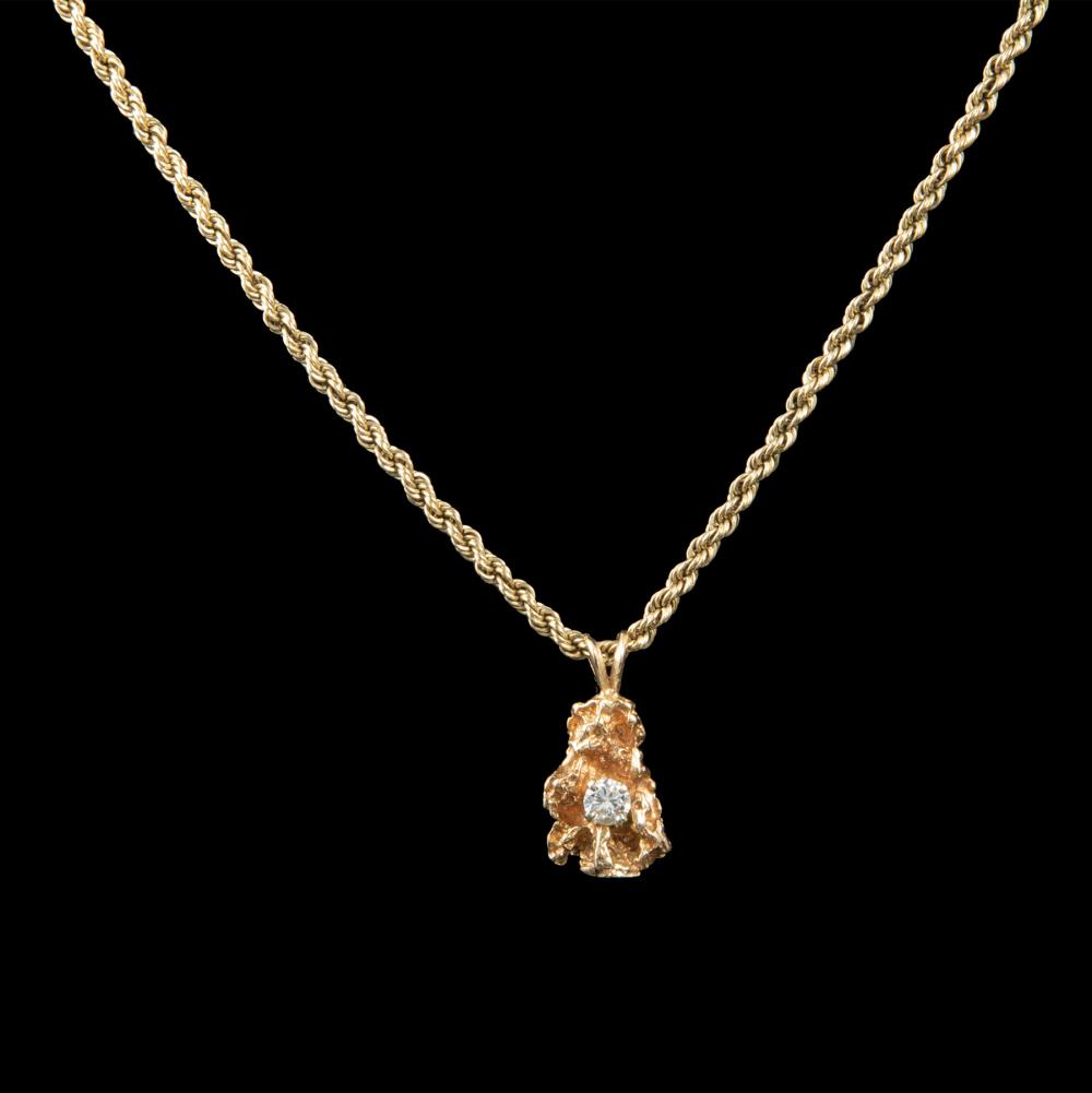 Appraisal: kt Yellow Gold Rope Chain with Gold Nugget Pendant set