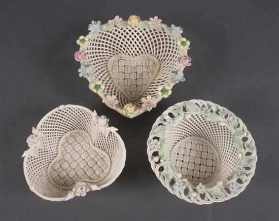 Appraisal: Three Belleek glazed parianware reticulated baskets early th century heart-shaped