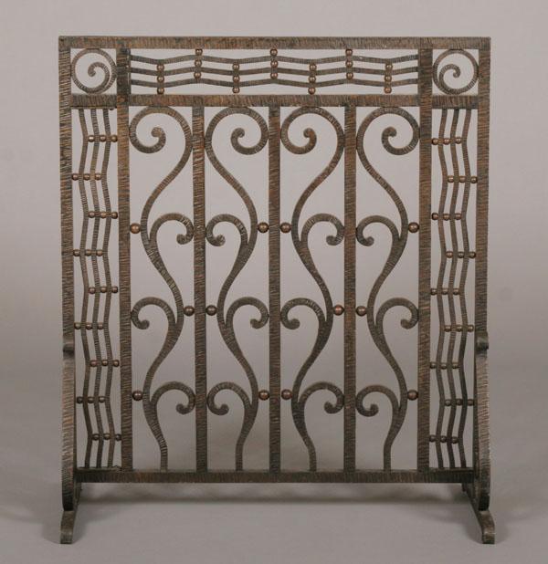 Appraisal: French Art Deco wrought iron firescreen with textured lineal detail