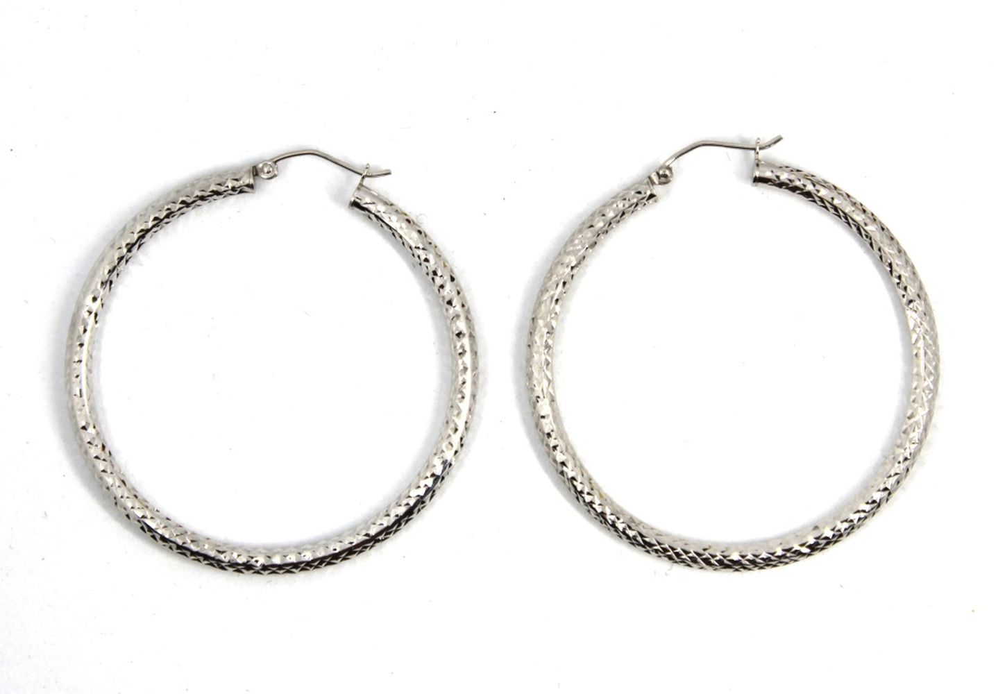 Appraisal: CONTEMPORARY MODERN K WHITE GOLD HOOP EARRINGS Contemporary modern K