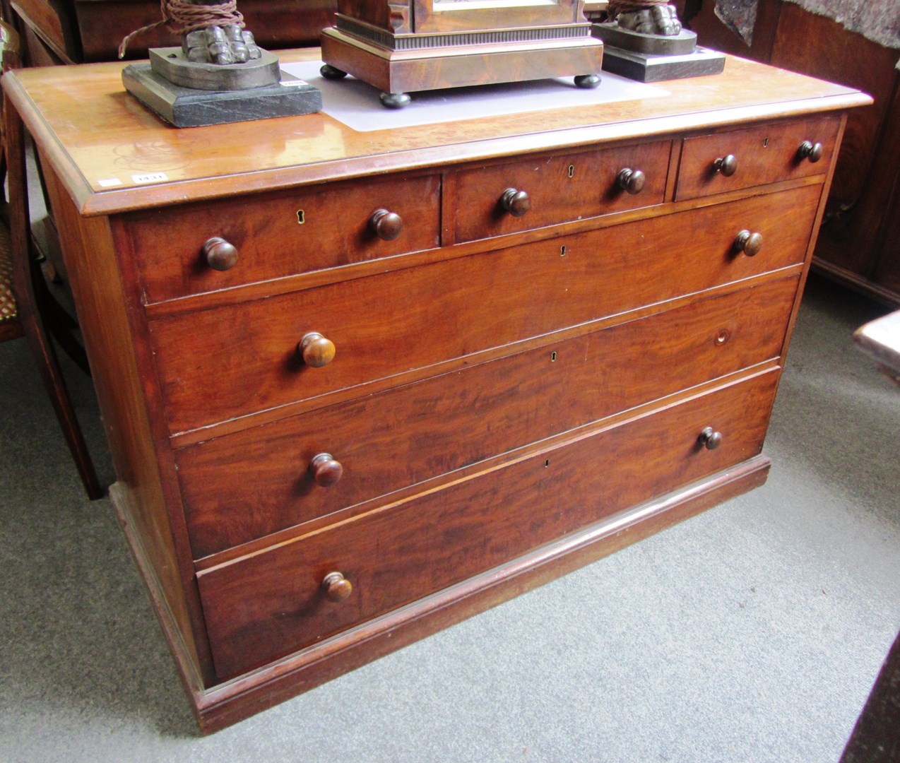 Appraisal: An early Victorian mahogany chest of three short and three