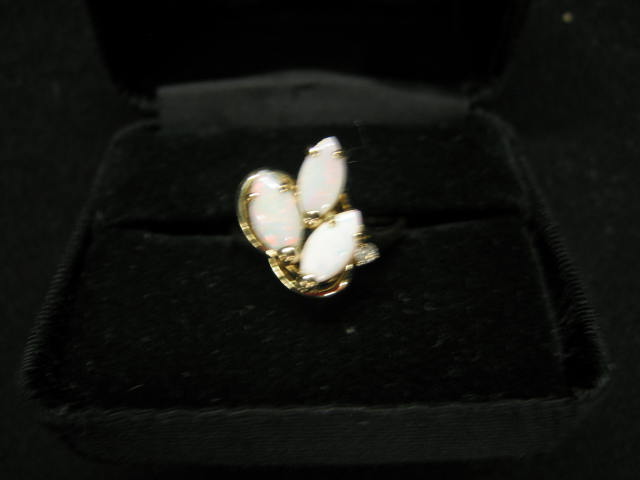 Appraisal: Opal Diamond Ring fiery marquis gem and single diamond in