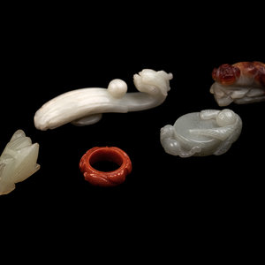 Appraisal: Chinese Jade and Hardstone Carvings including a jade belt hook