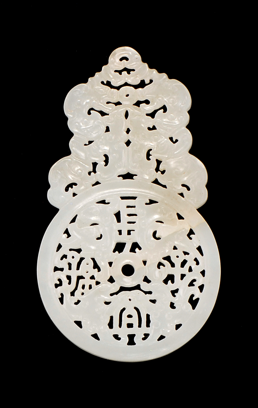 Appraisal: WHITE JADE PENDANT With pierced coin design and dragon finial