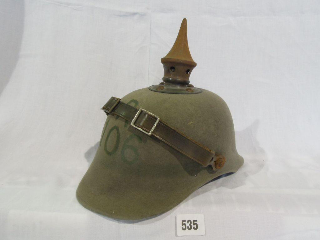 Appraisal: A green felt Pickelhube helmet circa First World War with