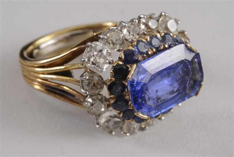 Appraisal: SAPPHIRE AND DIAMOND GOLD RING Damage to sapphire Size