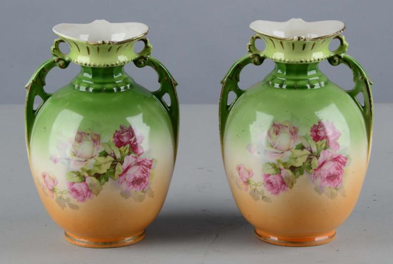 Appraisal: Pair Of Matching Victorian Ceramic Vases Vases are green and