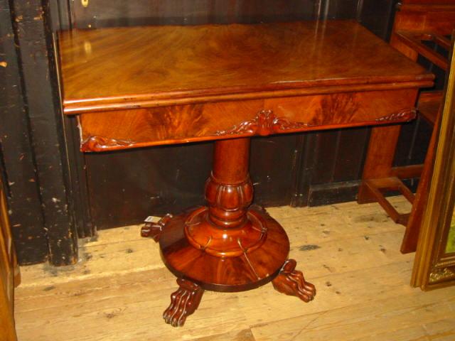 Appraisal: A VICTORIAN MAHOGANY FOLDING TEA TABLE of oblong form with