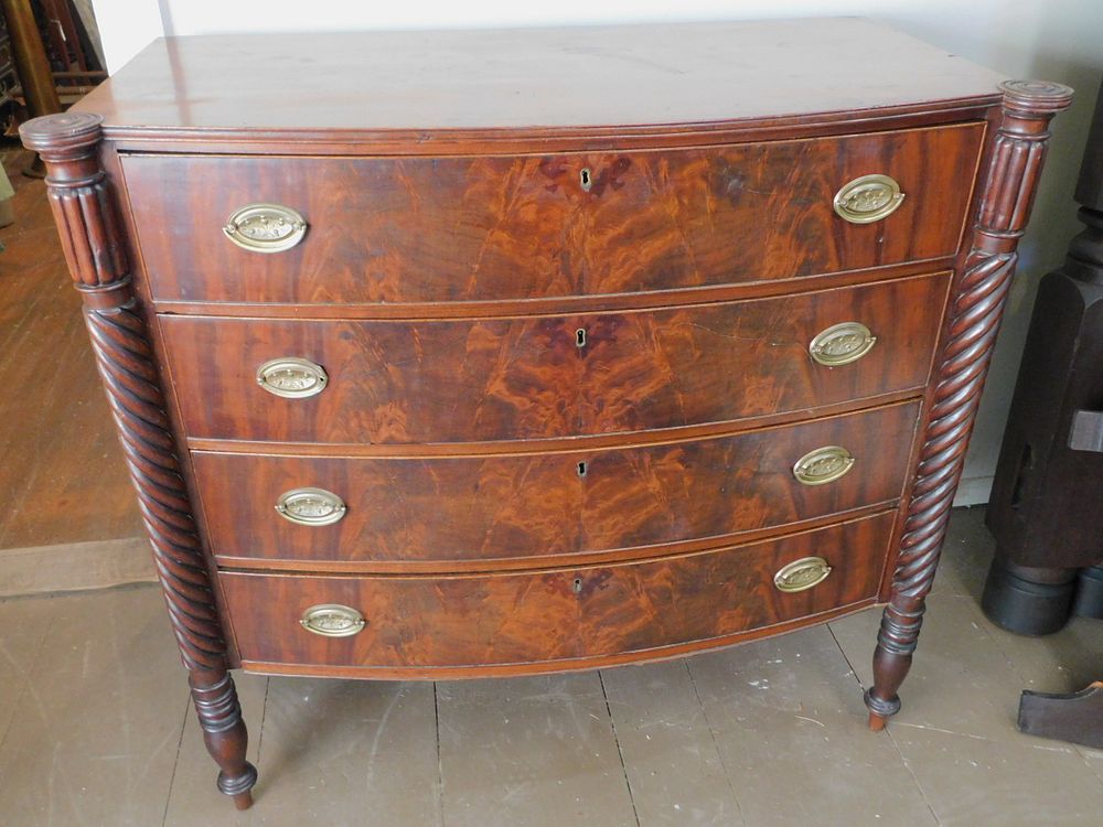 Appraisal: PERIOD BOSTON SHERATON CHEST Period Sheraton flame mahogany bow front