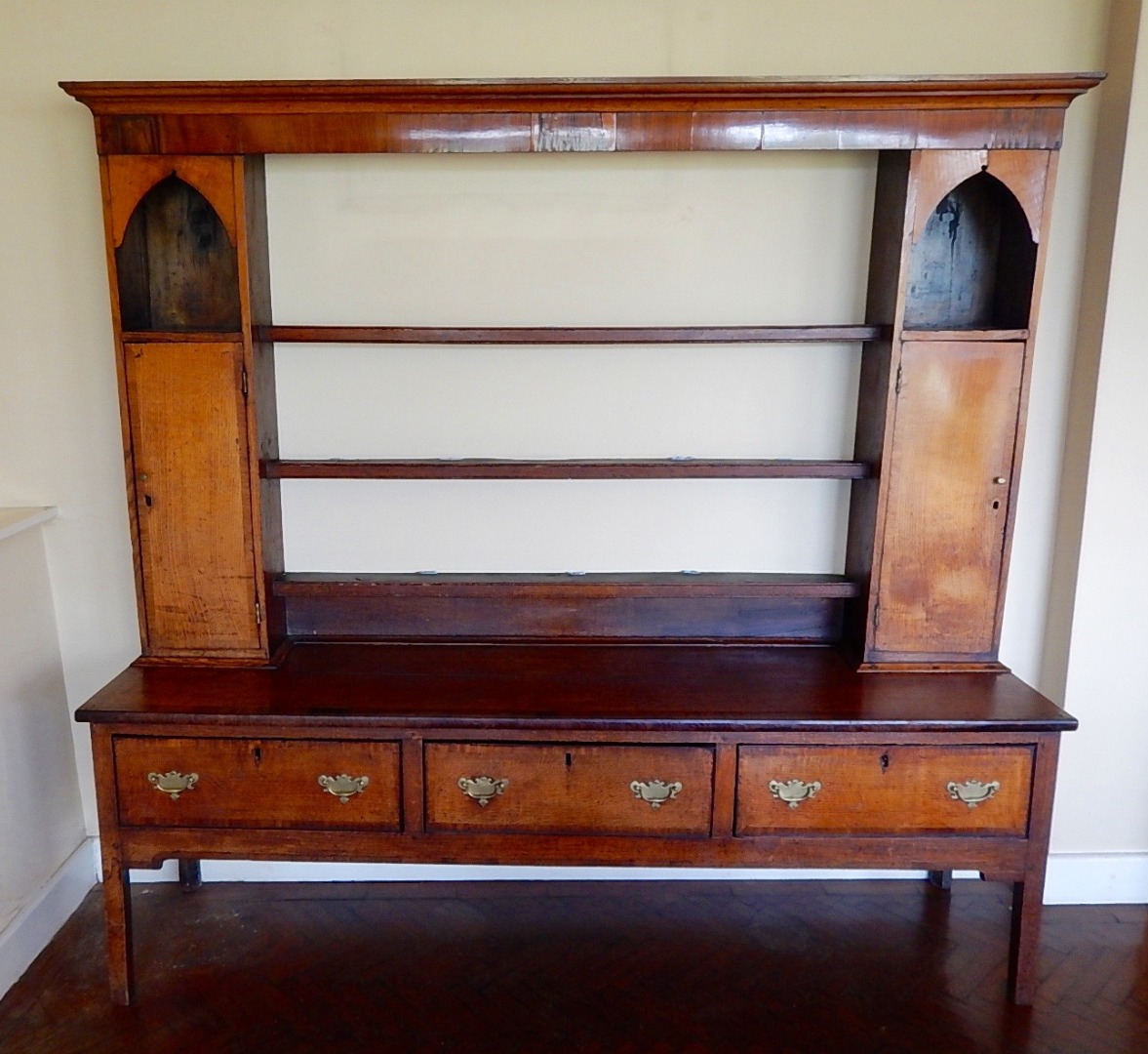 Appraisal: A George III oak dresser with mahogany crossbanding the plate