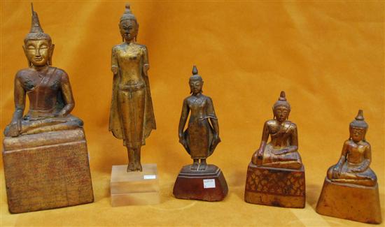 Appraisal: GROUP OF FIVE ANTIQUE CARVED AND GILT BUDDHAS The largest