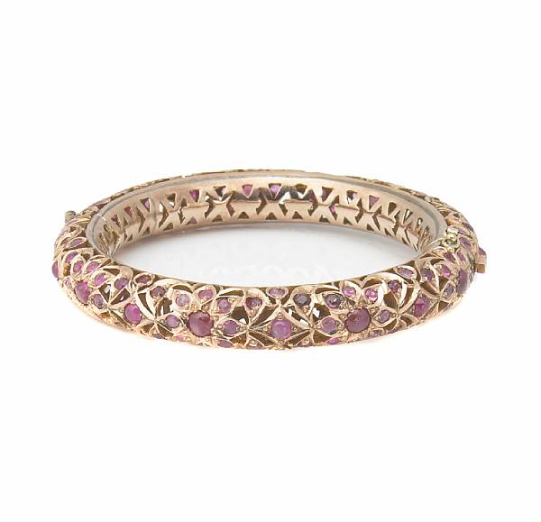 Appraisal: A ruby and k rose gold bangle hollow tube set