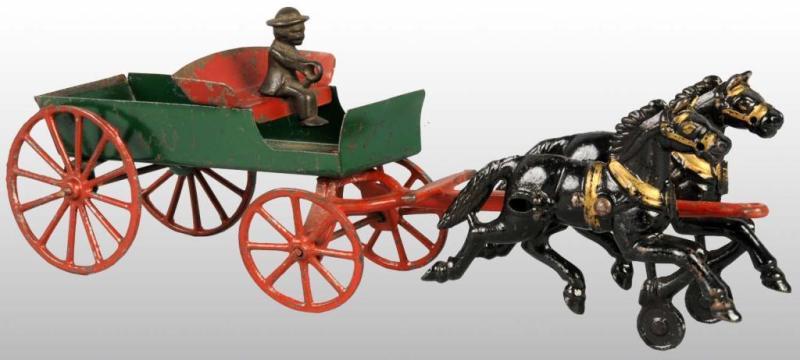 Appraisal: Cast Iron Tin Hubley Farm Wagon Toy Description Pulled by