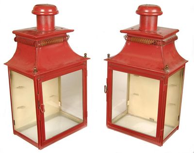 Appraisal: A pair of red tole hall lanterns each with a