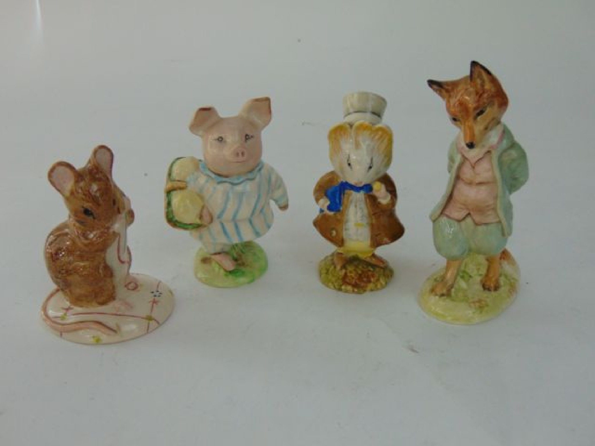 Appraisal: A collection of four Beswick Beatrix Potter figures comprising Little