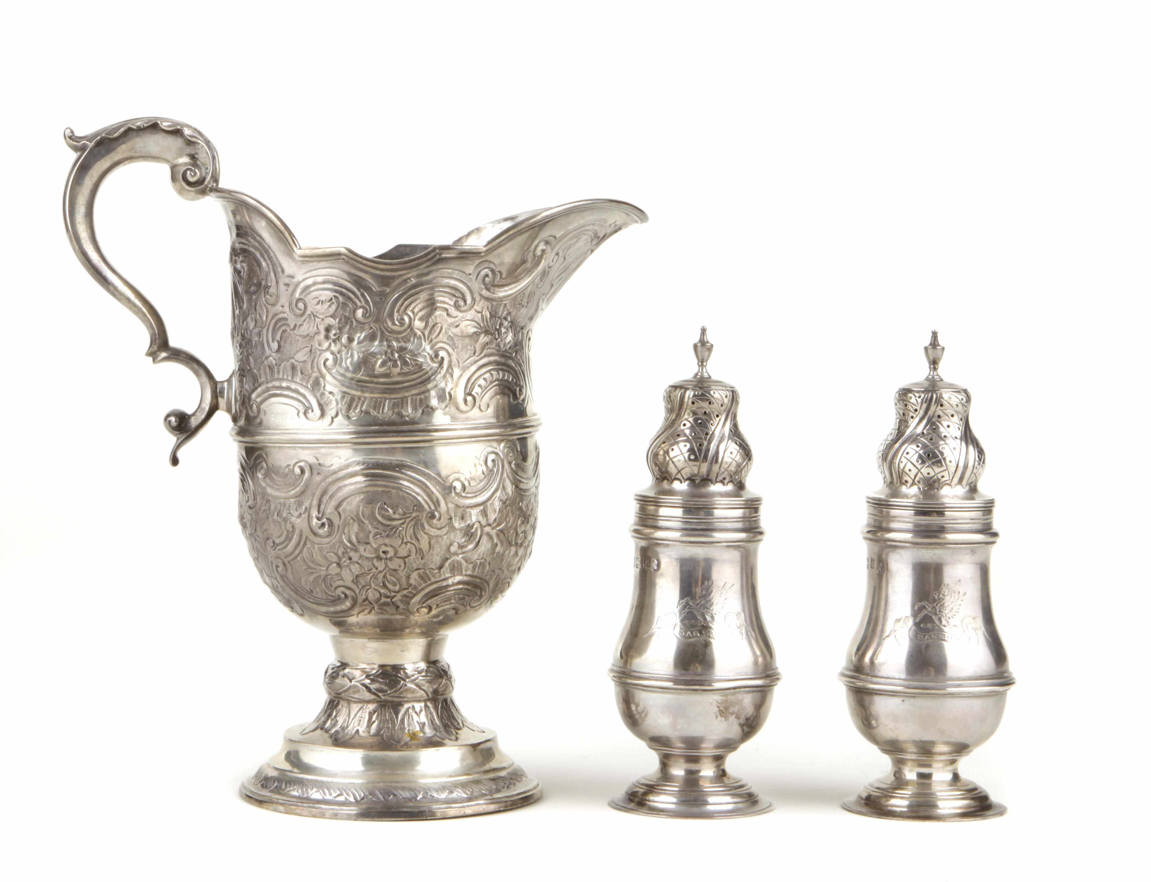 Appraisal: A pair of George III sterling silver casters Chawner and