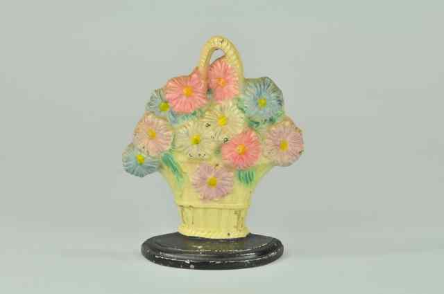 Appraisal: DAISIES DOORSTOP BOOK EXAMPLE Hubley cast iron marked '' ''