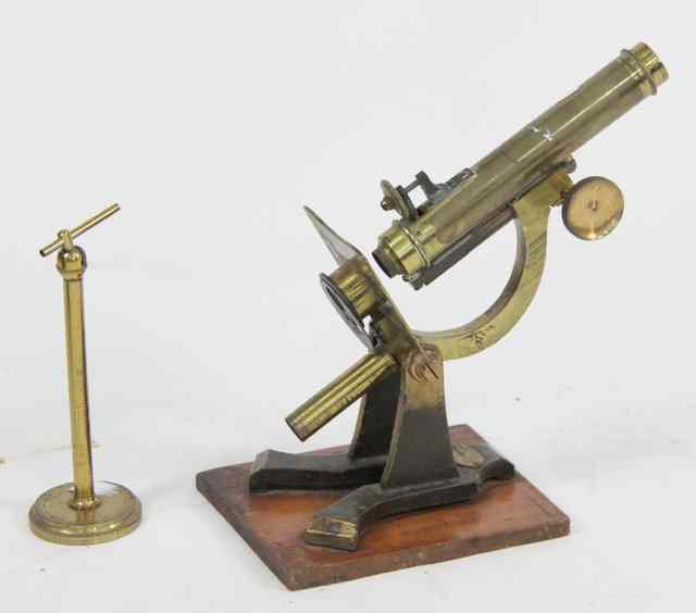 Appraisal: A brass microscope by J and C Robbins London in