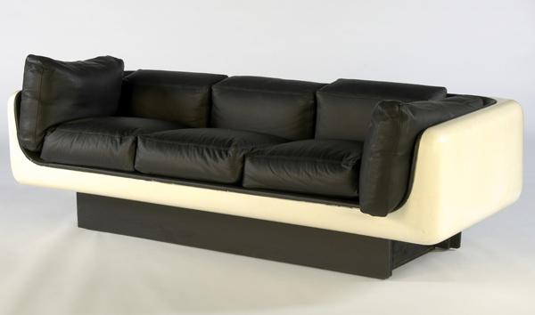 Appraisal: STEELCASE Sofa with black leather upholstery on molded white fiberglass