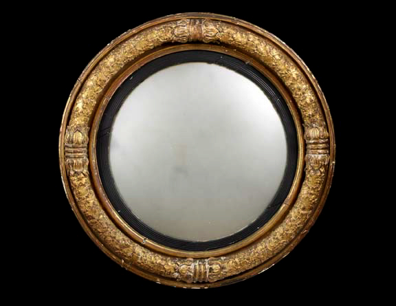 Appraisal: Unusual Regency Carved Parcel-Ebonized and Gilded Convex Looking Glass first