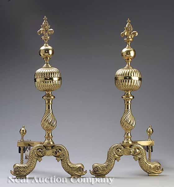 Appraisal: A Pair of Ornate English Brass Andirons c having dolphin