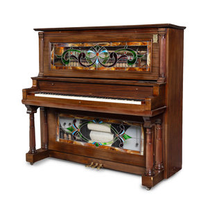 Appraisal: An American Mahogany and Leaded Glass Mounted Orchestrion with an