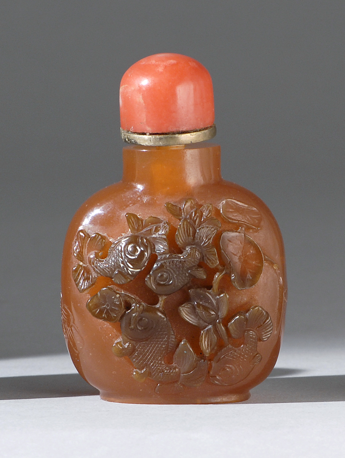 Appraisal: OVERLAY GLASS SNUFF BOTTLE Early th CenturyIn square form simulating