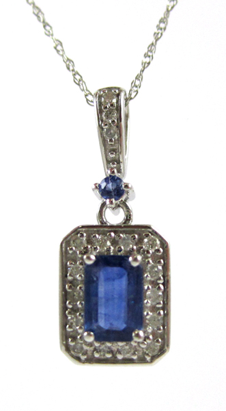 Appraisal: FOURTEEN KARAT WHITE GOLD SAPPHIRE AND DIAMOND PENDANT suspended on