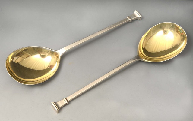 Appraisal: A PAIR OF SILVER GEORGIAN STYLE SEAL SPOONS the outsize