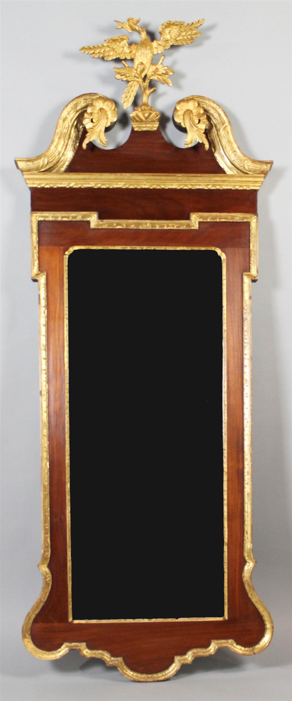 Appraisal: GEORGE II CARVED MAHOGANY AND PARCEL GILT MIRROR third quarter