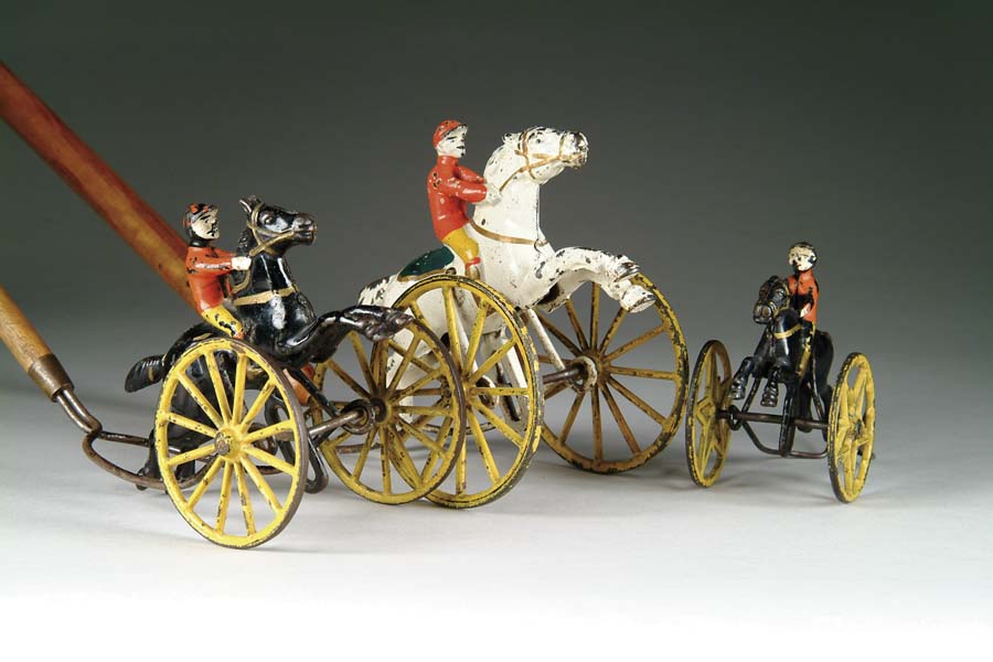 Appraisal: WILKINS HORSE JOCKEY PUSH TOYS Pictured in Wilkins catalog Charming