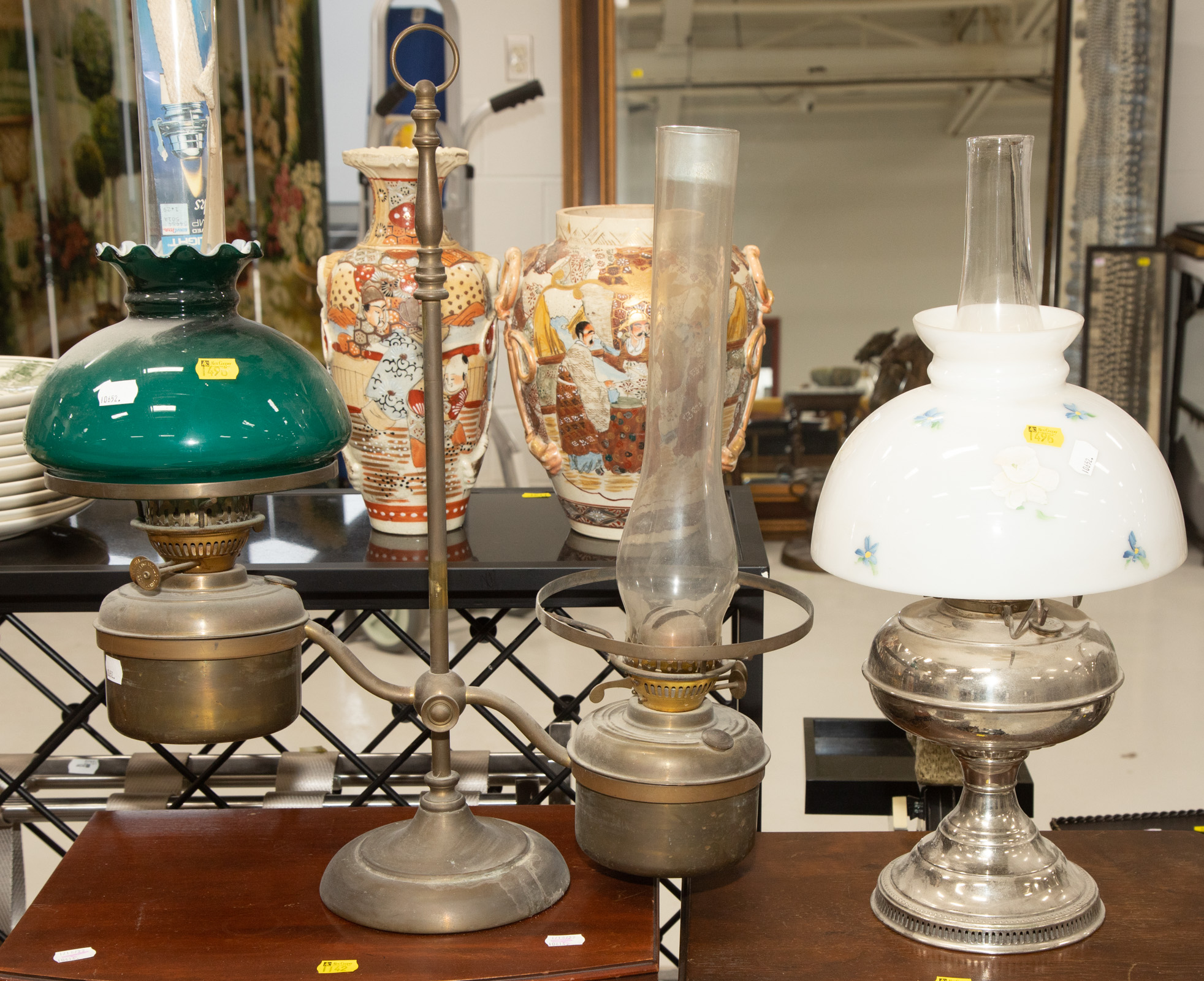 Appraisal: TWO ANTIQUE LAMPS Includes oil burning student lamp missing one