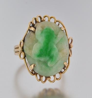 Appraisal: A Carved Jadeite Ring k yellow gold ring set with