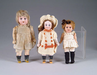 Appraisal: FIVE SMALL DOLLS - TO - HT This lot contains