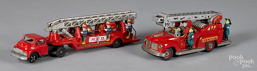 Appraisal: Two Japanese tin litho fire ladder trucks Two Japanese tin